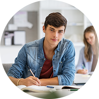 Boy at desk smiling